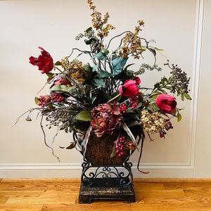 gorgeous artificial flowers in metal vase